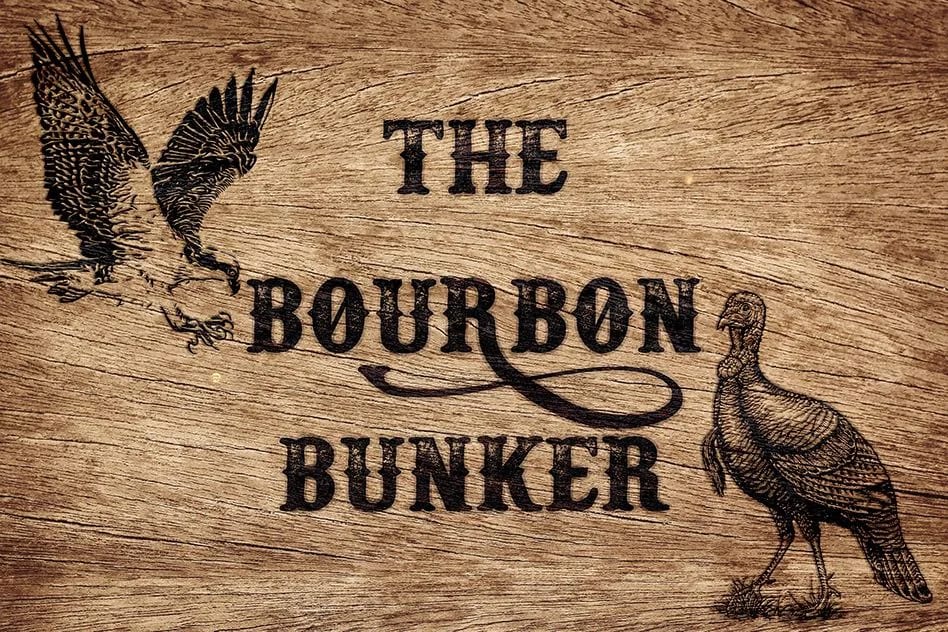 The Bourbon Bunker logo with illustrated birds on a textured background.